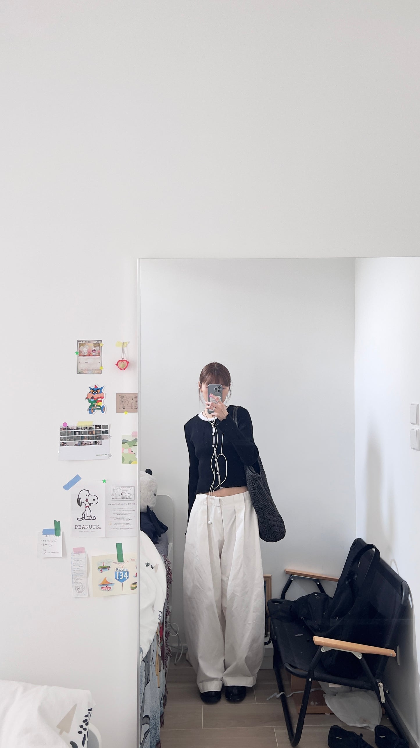 the elodie ruffle cardigan in black