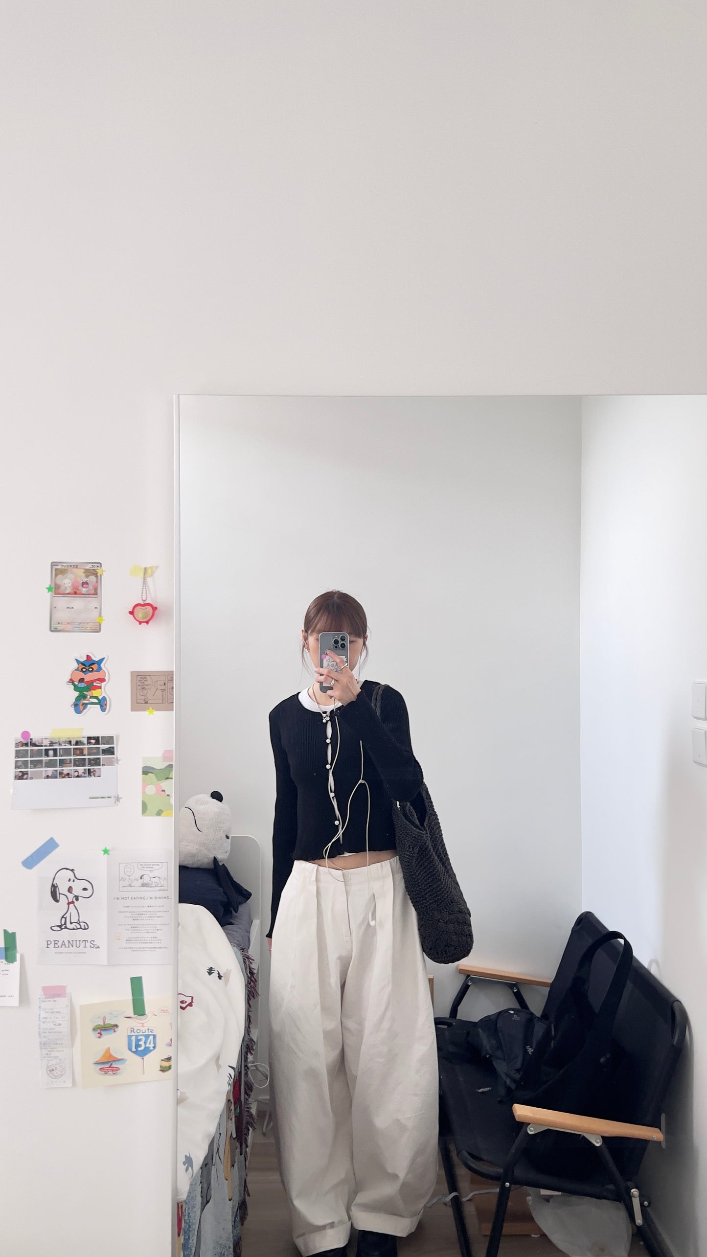 the elodie ruffle cardigan in black