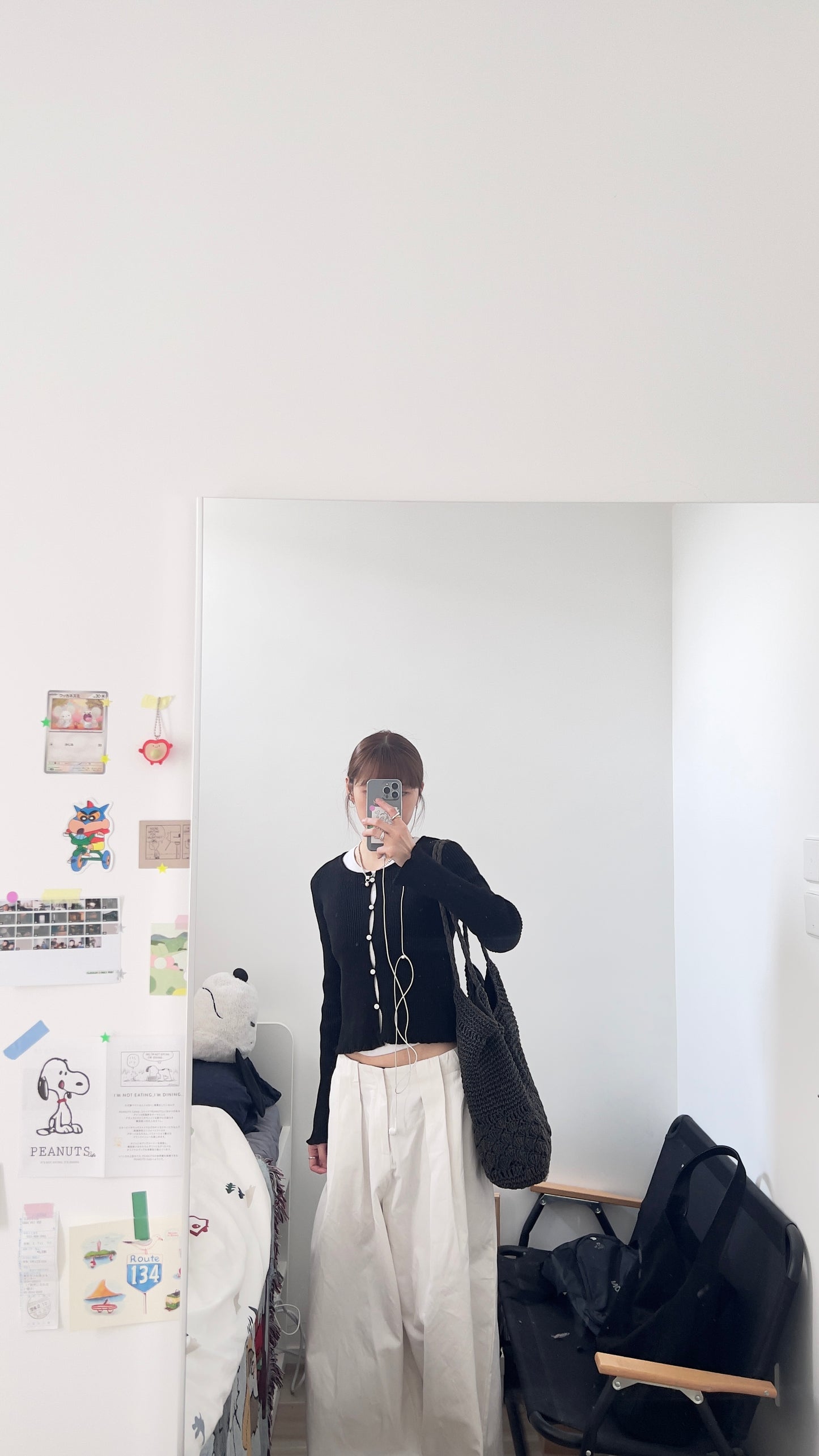 the elodie ruffle cardigan in black