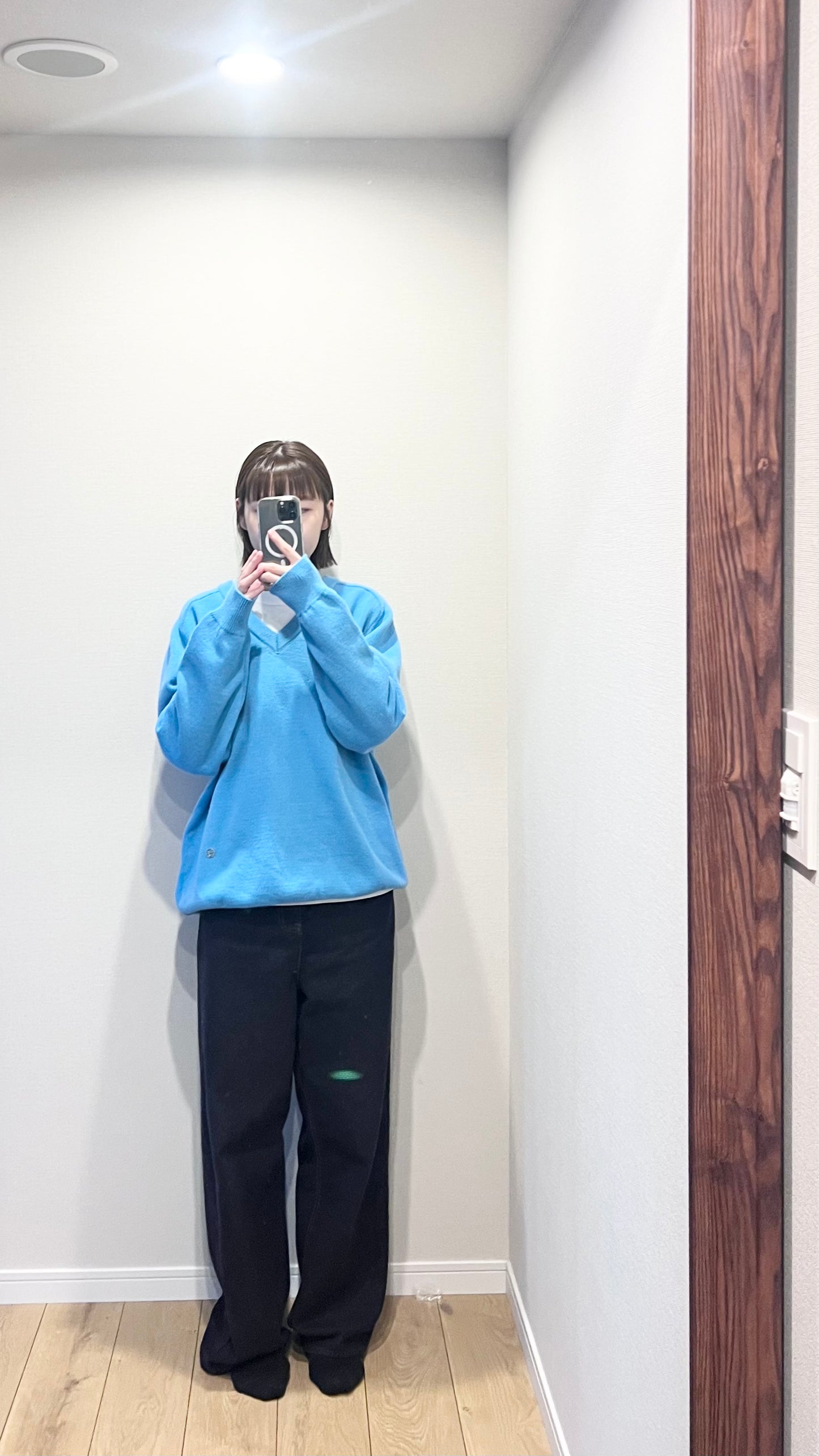 classic gender free v-neck wool sweater in lake blue