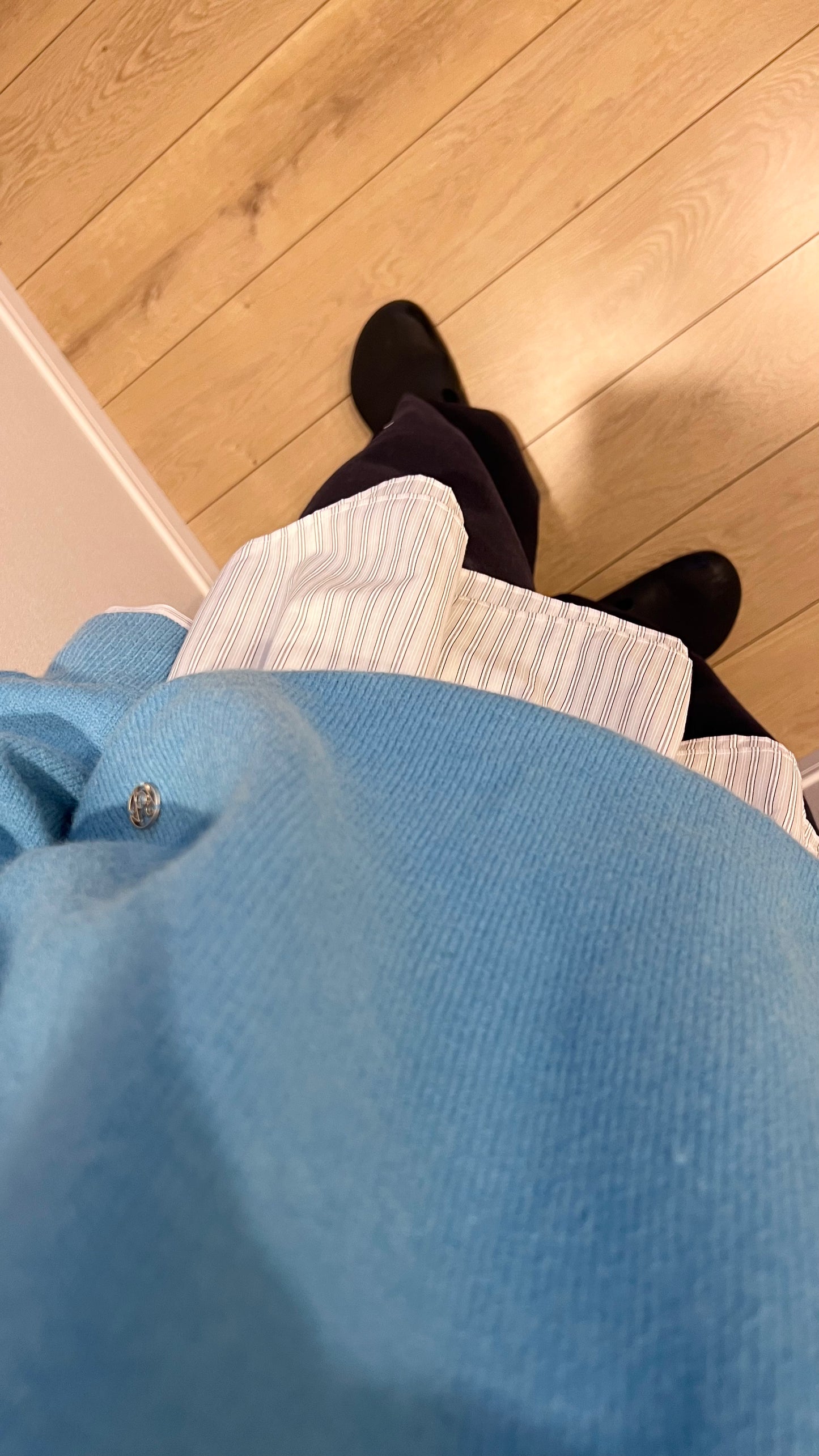 classic gender free v-neck wool sweater in lake blue