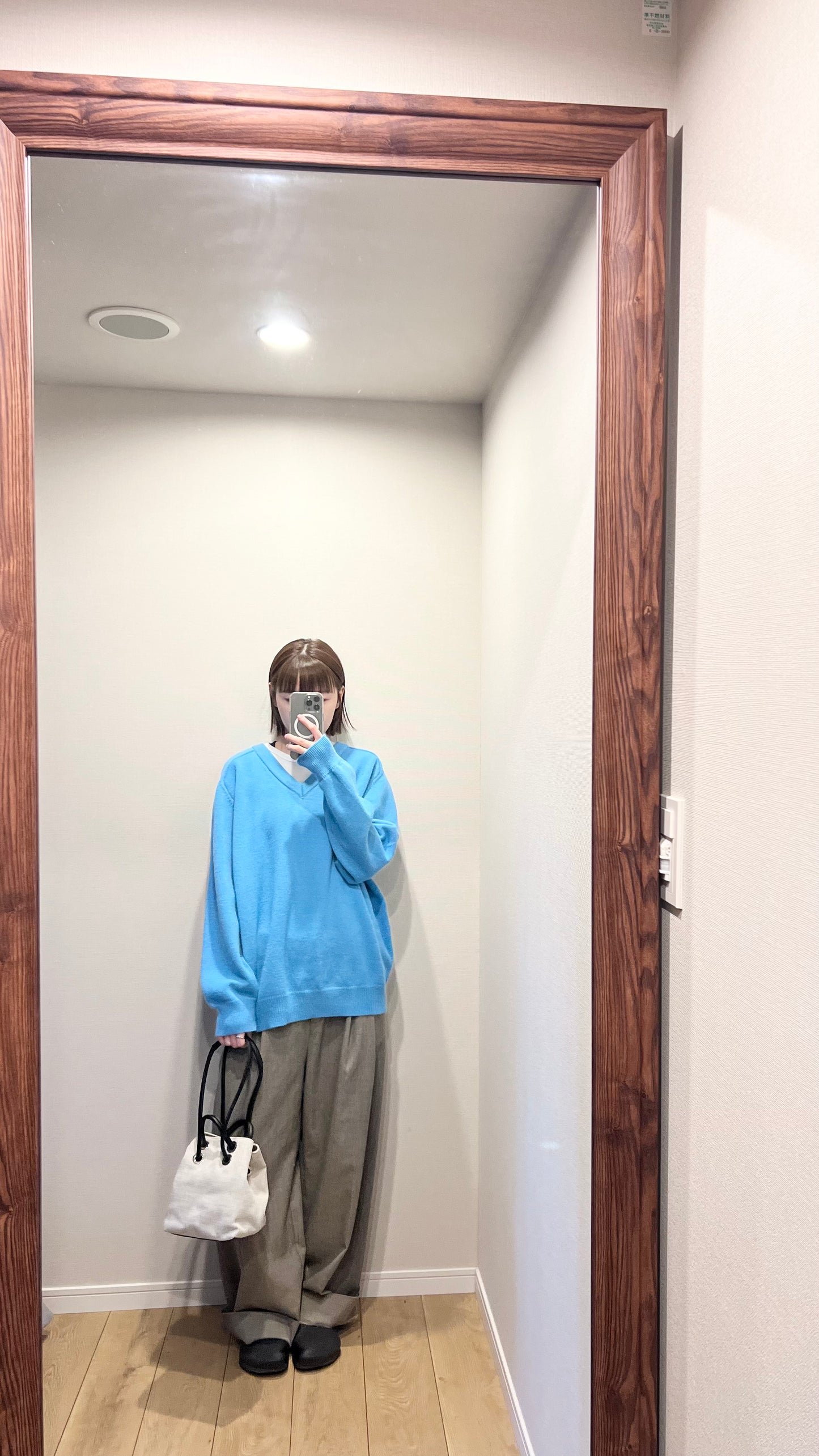 classic gender free v-neck wool sweater in lake blue
